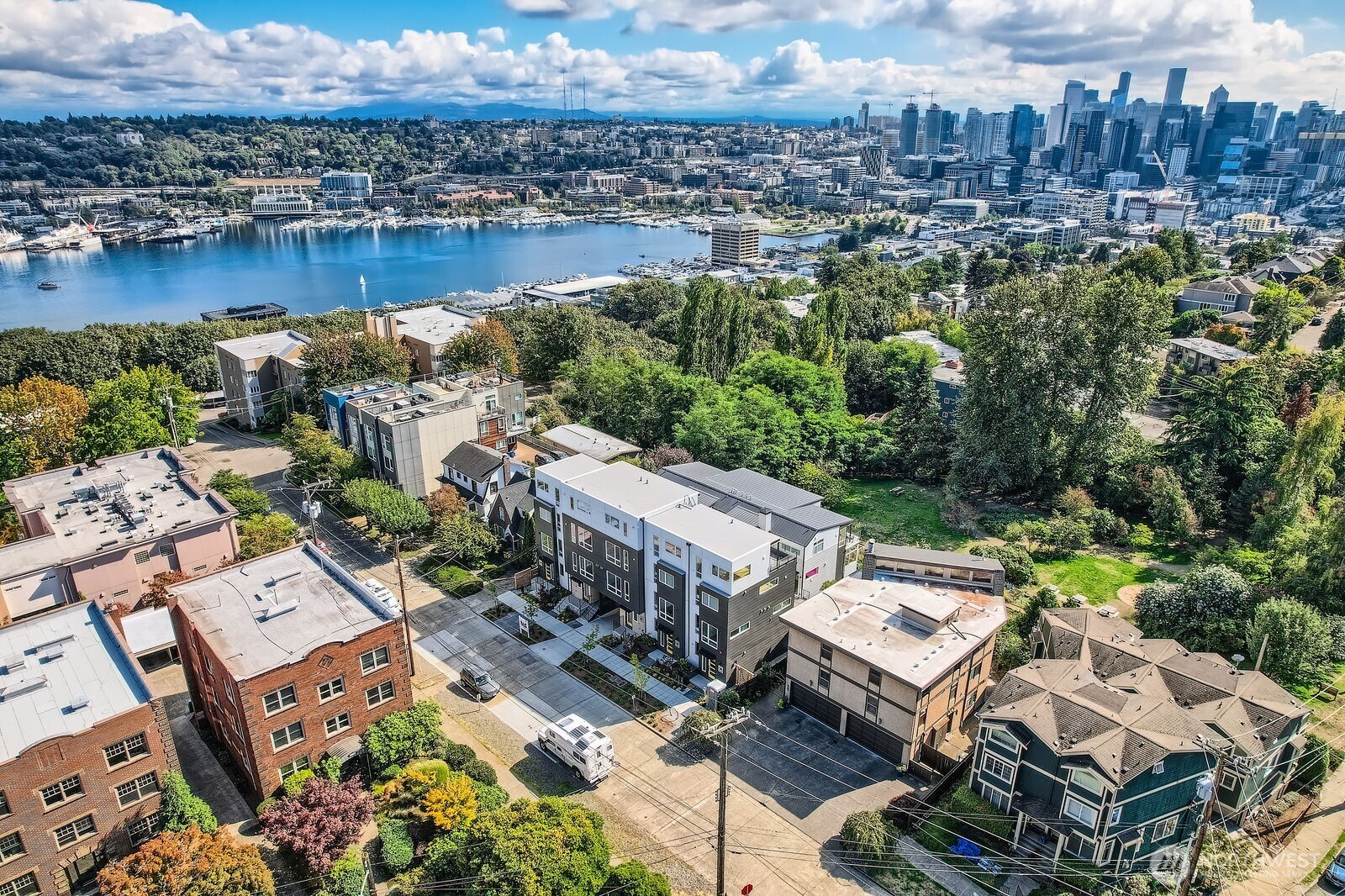 515 Howe Street, Unit A Seattle, WA 98109 - Photo 38 of 40 an aerial view of a house with a lake view