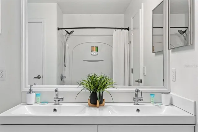 a swimming pool with lots of green space