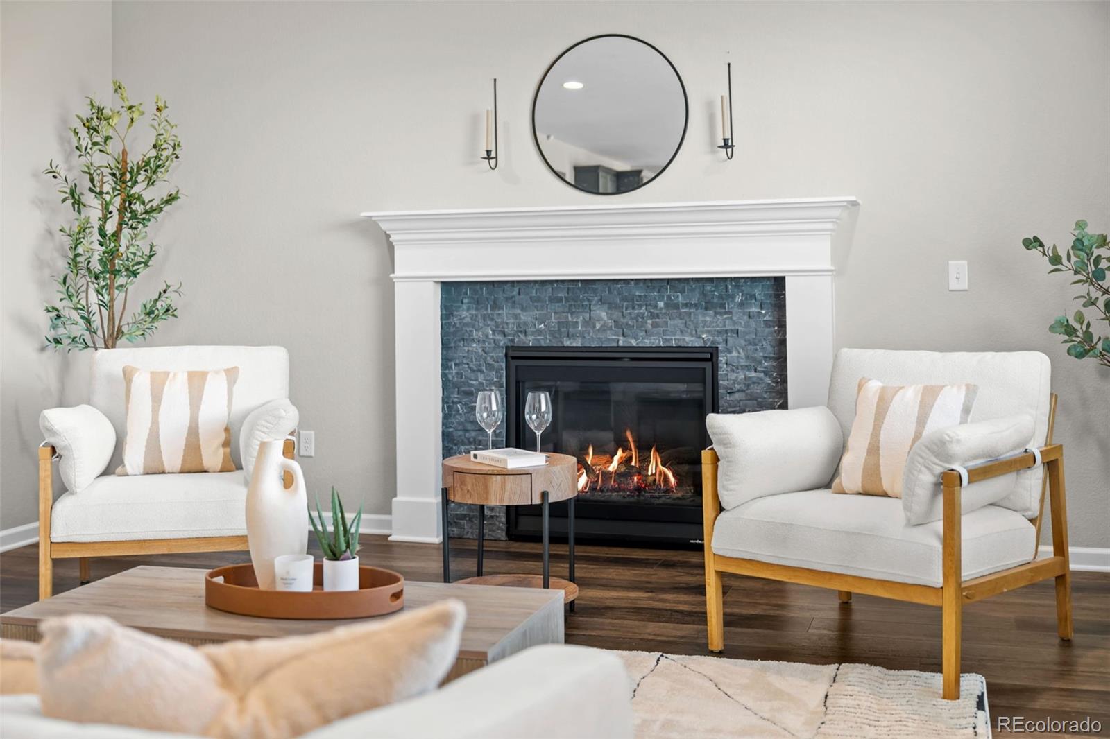 450 Pikes View Drive Erie, CO 80516 - Photo 21 of 45 a living room with furniture and a fireplace