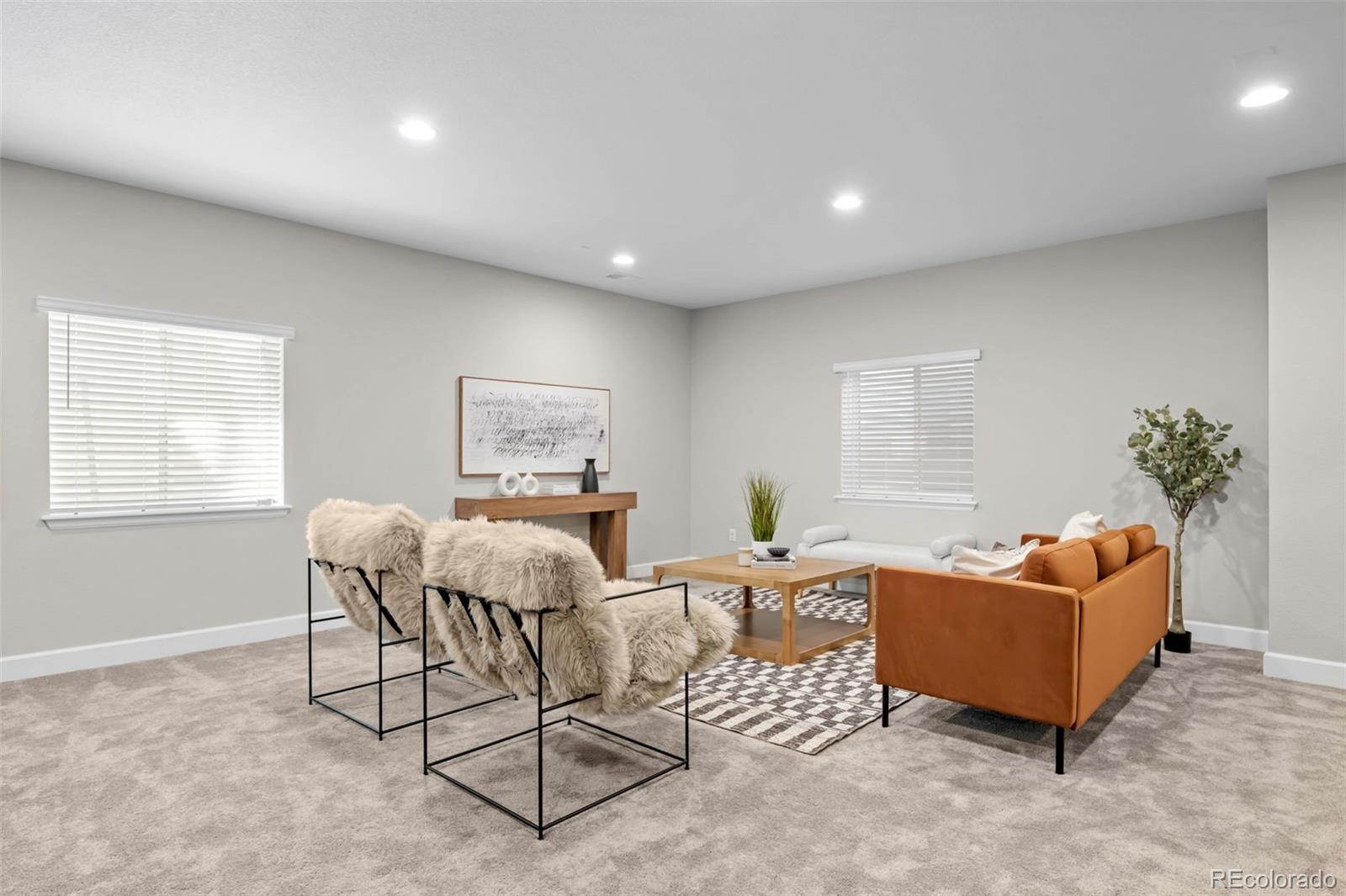 450 Pikes View Drive Erie, CO 80516 - Photo 34 of 45 a living room with furniture and a window