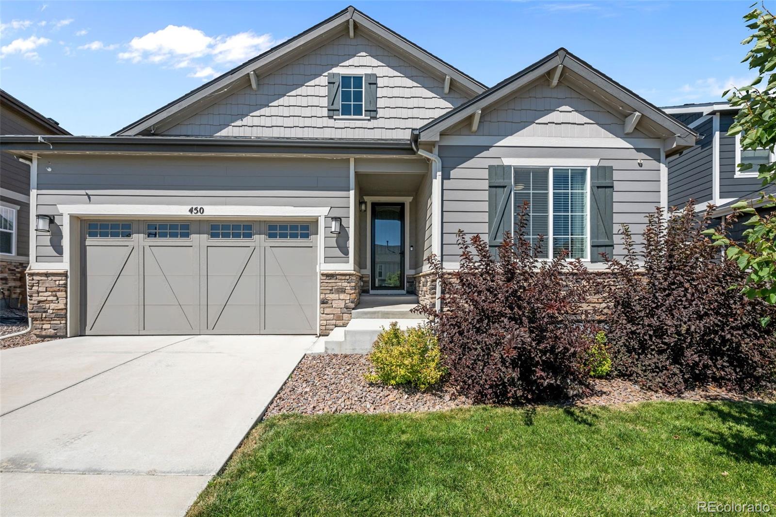450 Pikes View Drive Erie, CO 80516 - Photo 4 of 45 front view of a house with a yard