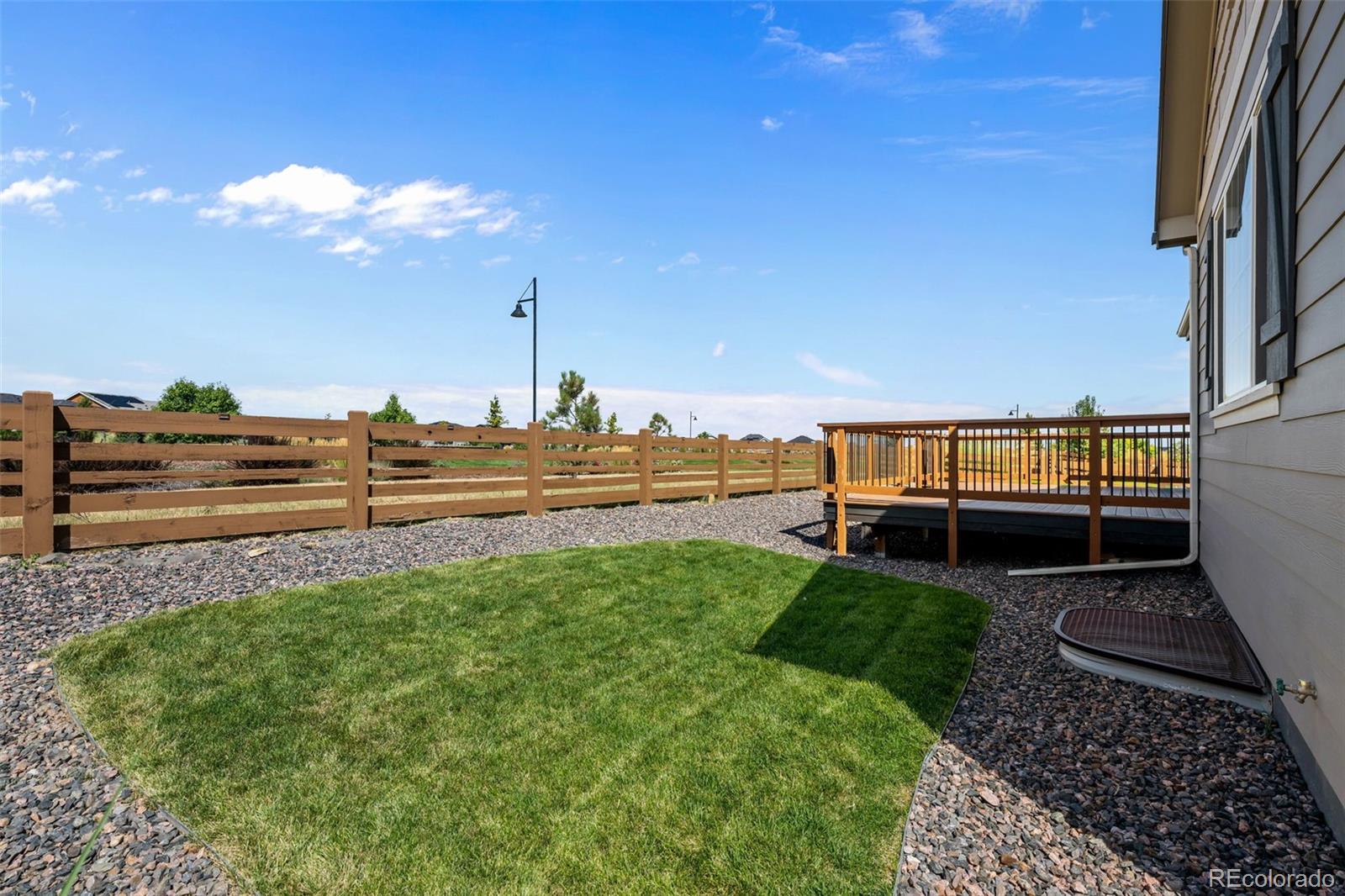 450 Pikes View Drive Erie, CO 80516 - Photo 45 of 45 a view of a yard with an ocean view