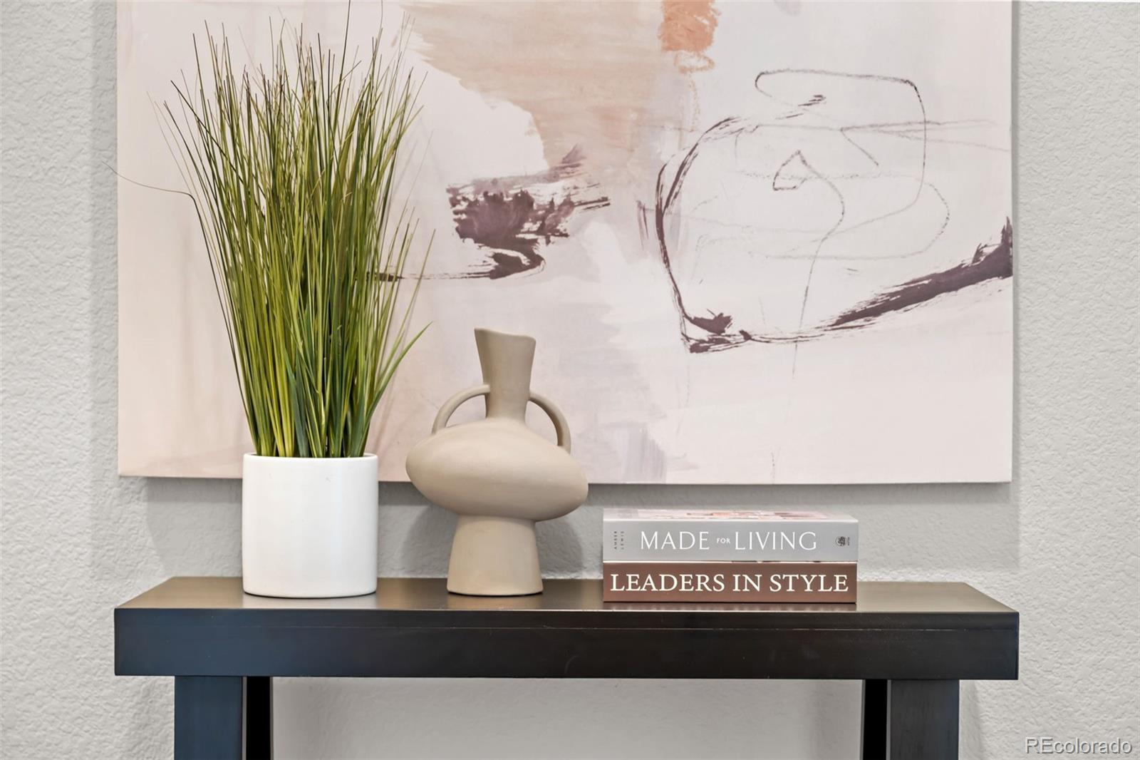 450 Pikes View Drive Erie, CO 80516 - Photo 7 of 45 a view of a bathroom with a sink and a mirror