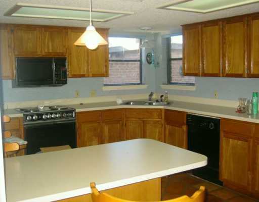 0 Middlecoff Corpus Christi, TX 78413 - Photo 3 of 3 a kitchen with a sink and a stove