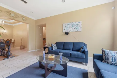a living room with furniture and a couch