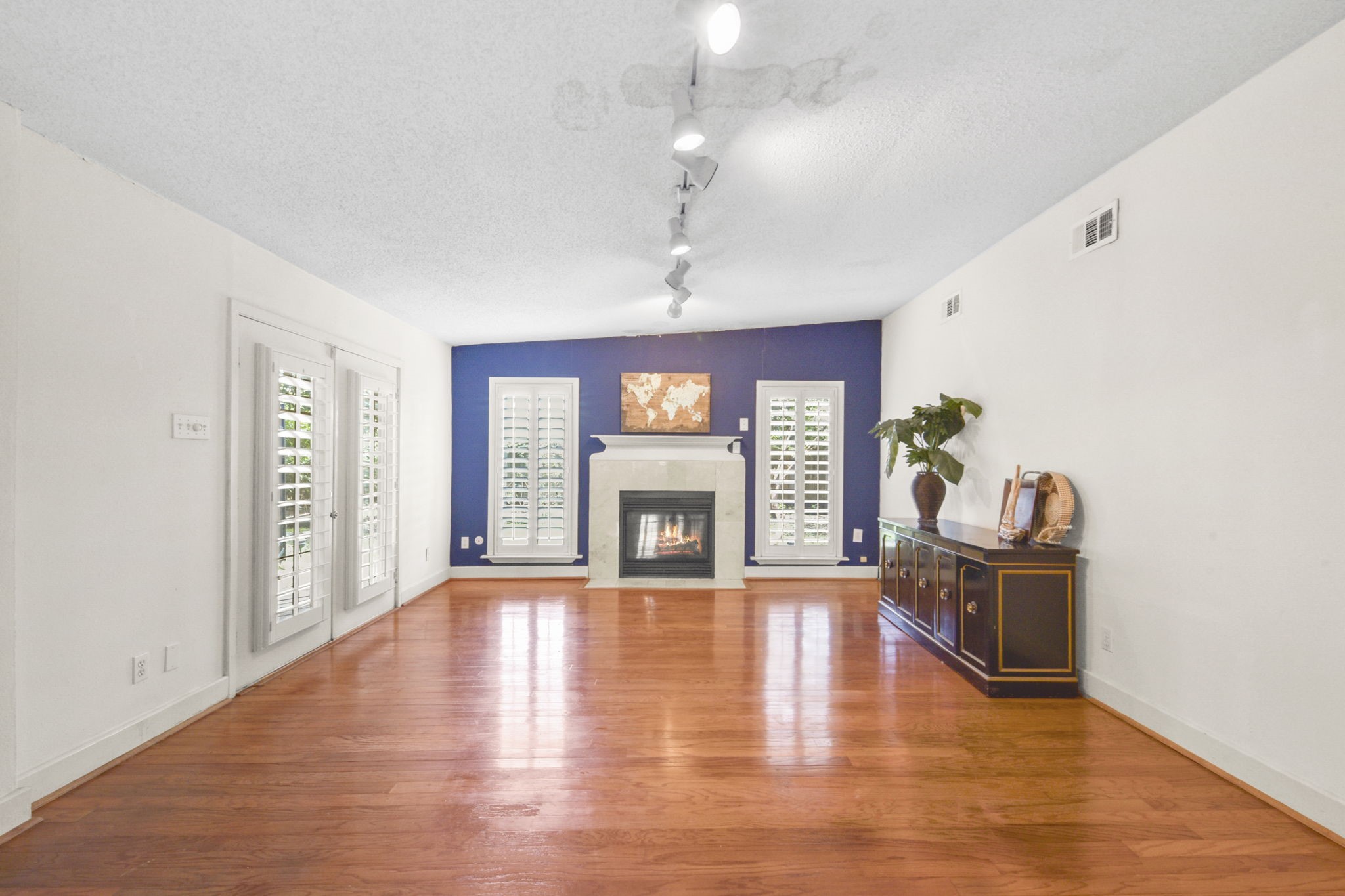 1202 Fay Road Kemah, TX 77565 - Photo 6 of 32 a living room with furniture and a fireplace