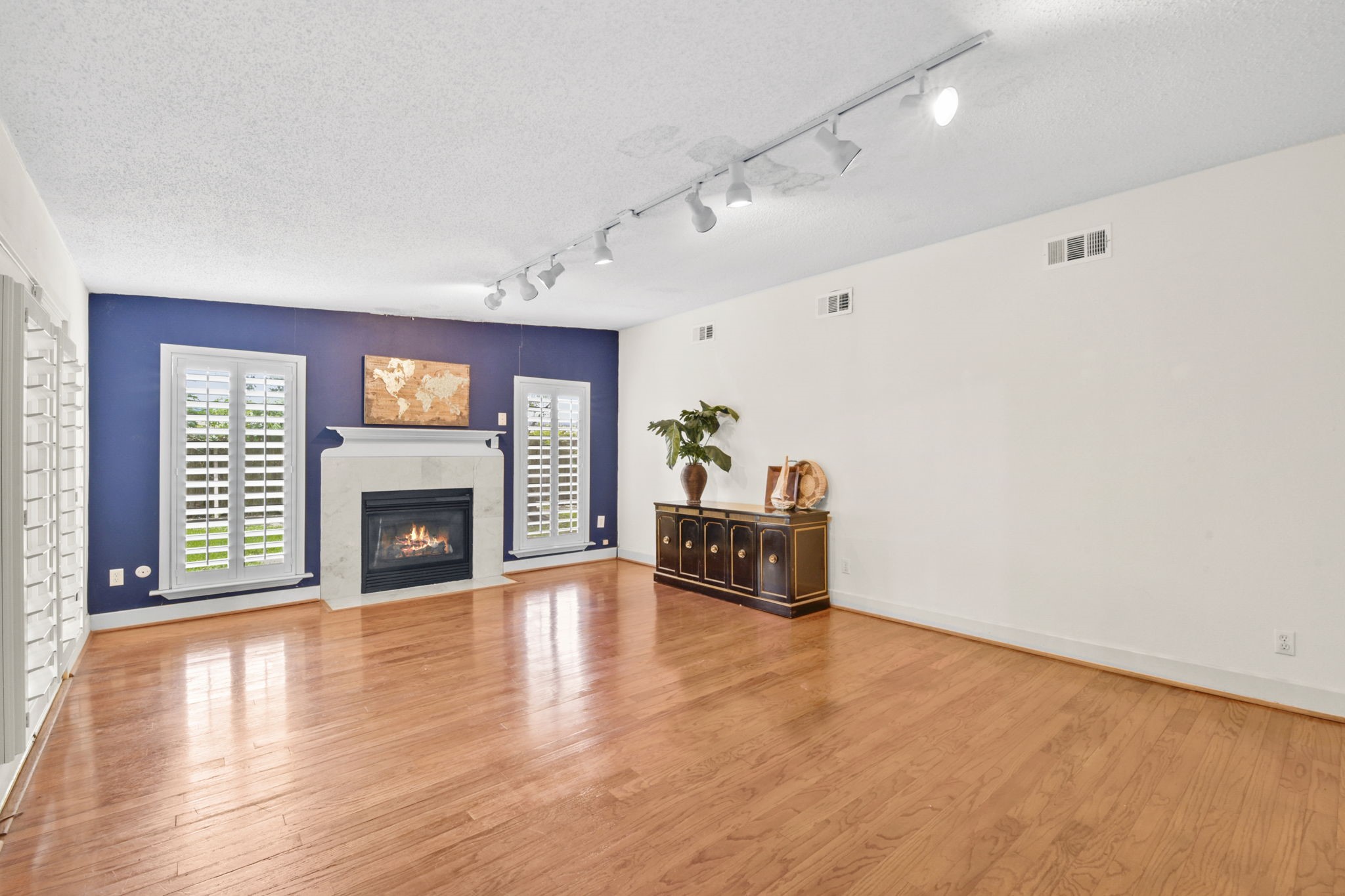1202 Fay Road Kemah, TX 77565 - Photo 7 of 32 a view of an empty room with a fireplace