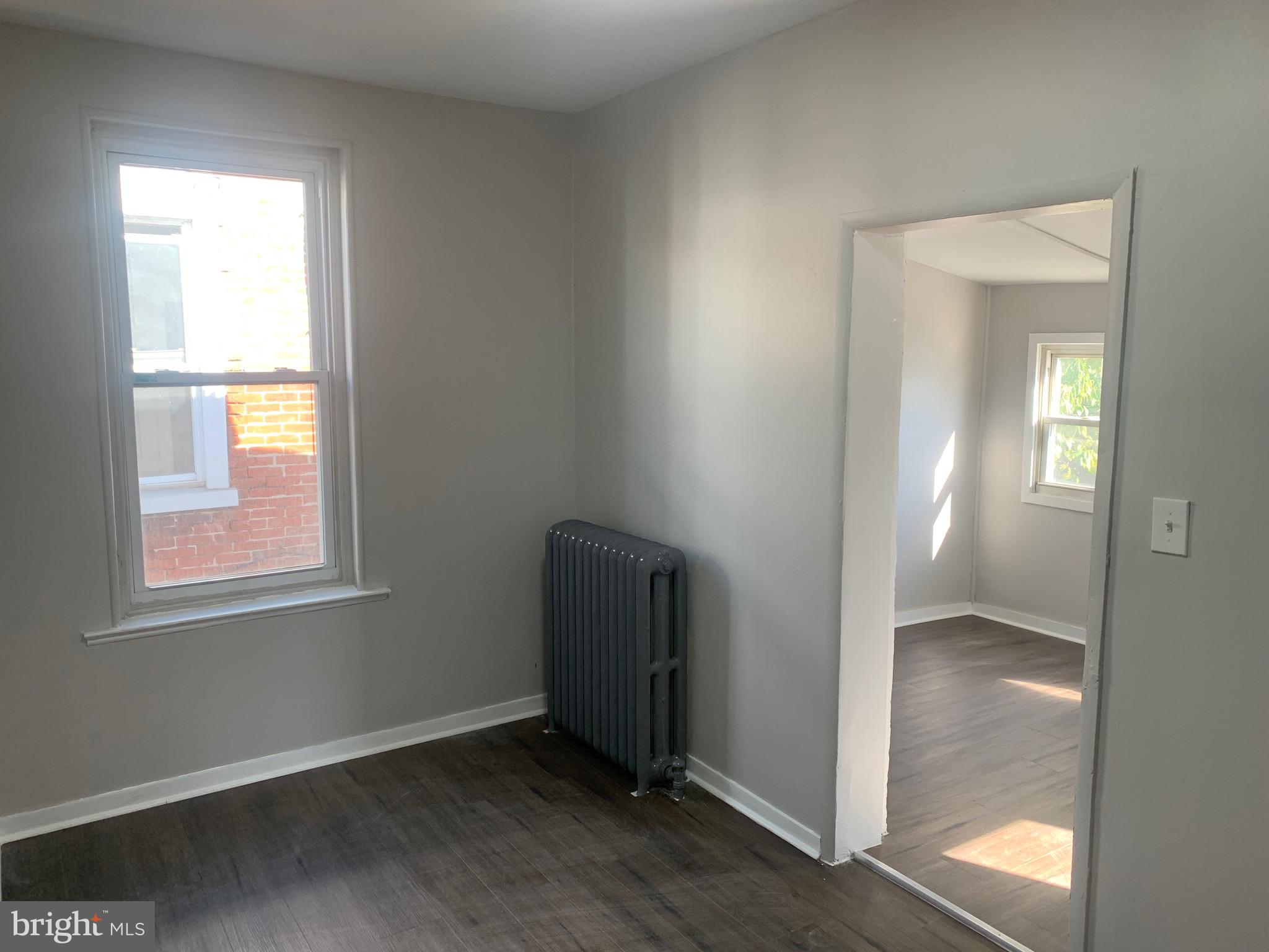 2387 Orthodox Street Philadelphia, PA 19137 - Photo 11 of 12 an empty room with windows and closet