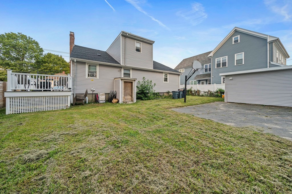 65 Wyvern Street Boston, MA 02131 - Photo 22 of 26 a front view of a house with a yard