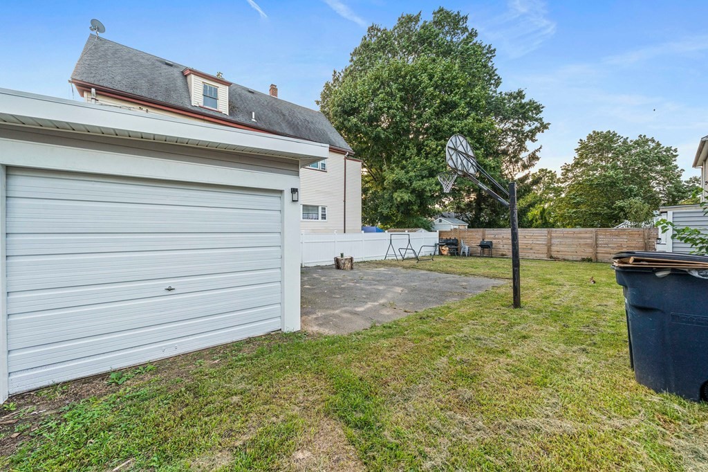 65 Wyvern Street Boston, MA 02131 - Photo 23 of 26 a view of backyard with green space
