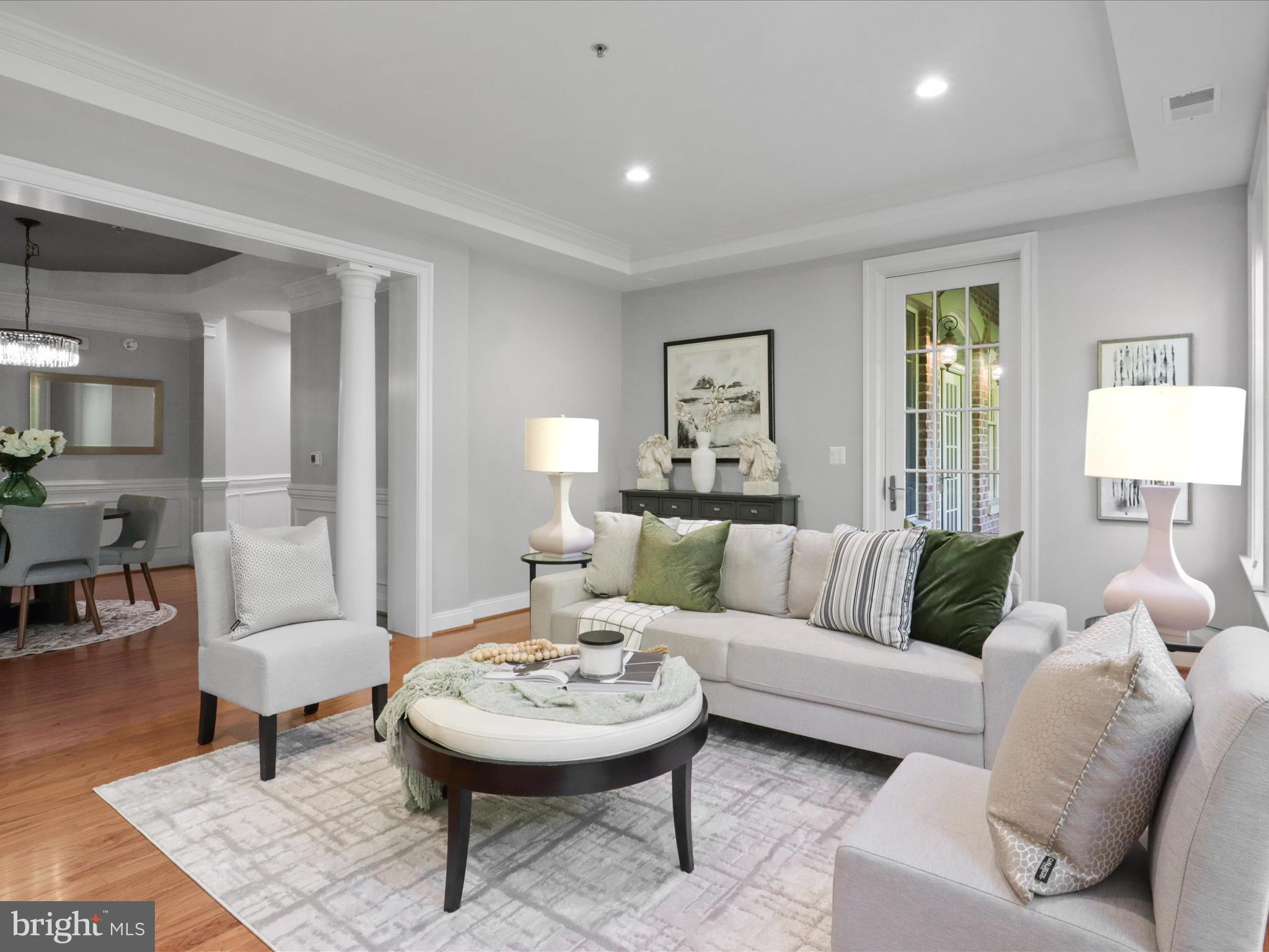 1781 Chain Bridge Road, Unit 303 McLean, VA 22102 - Photo 23 of 56 a living room with furniture and a table