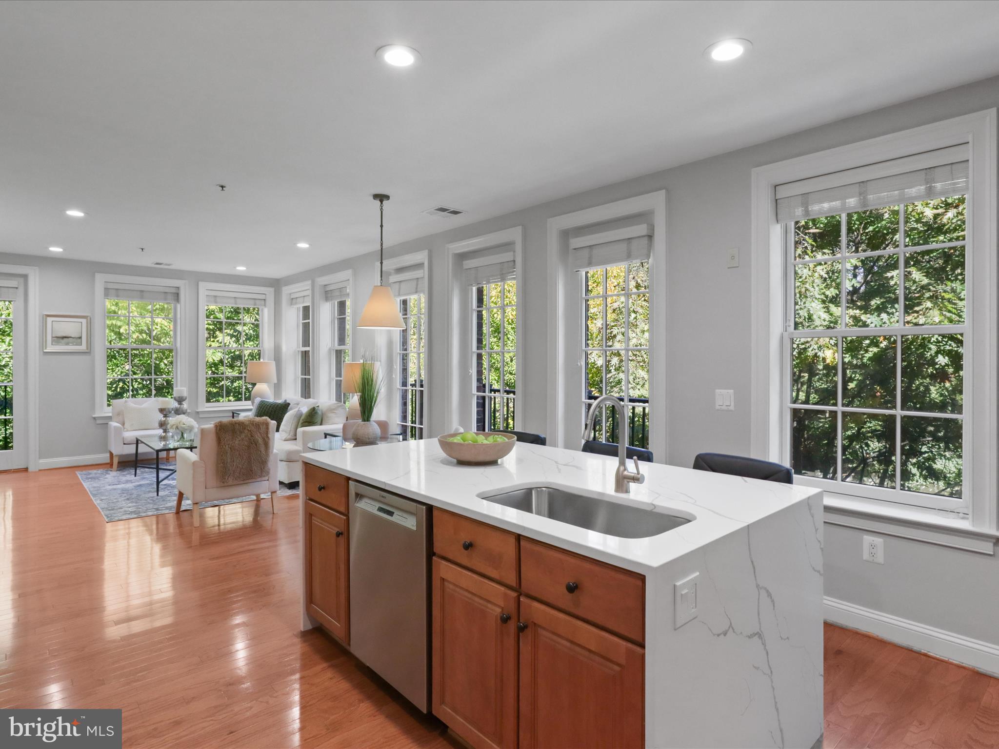 1781 Chain Bridge Road, Unit 303 McLean, VA 22102 - Photo 36 of 56 a kitchen with sink attached with living room