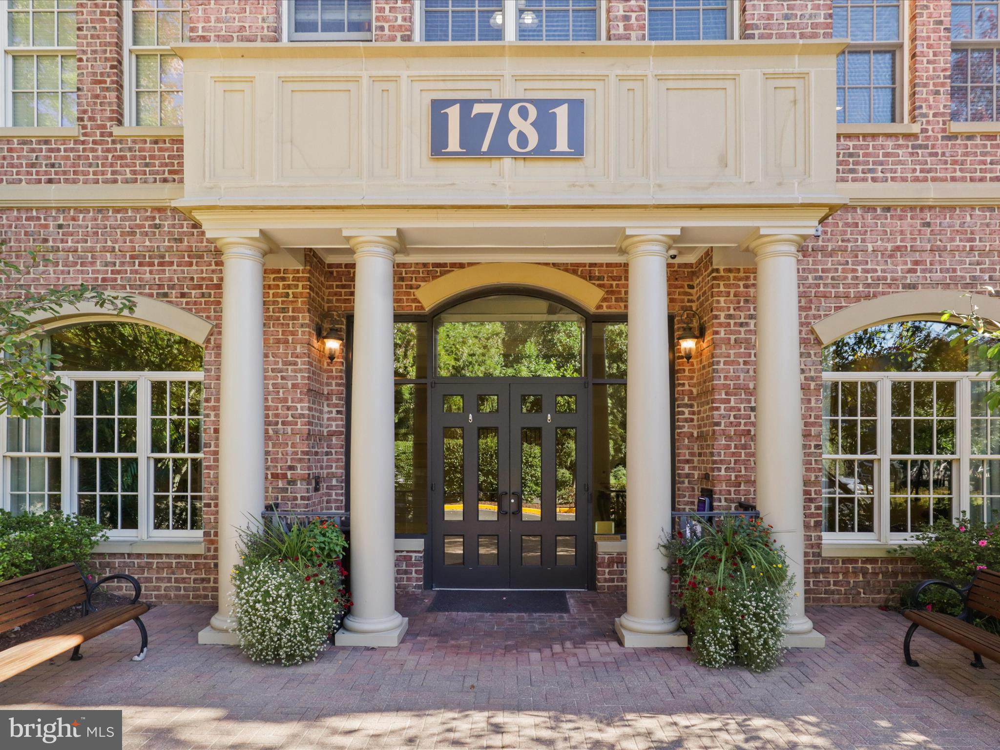 1781 Chain Bridge Road, Unit 303 McLean, VA 22102 - Photo 4 of 56 a front view of a building with potted plants