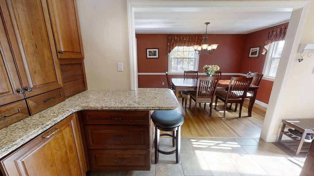 17 Oakcrest Road Needham, MA 02492 - Photo 11 of 31 a view of a dining room with furniture and window