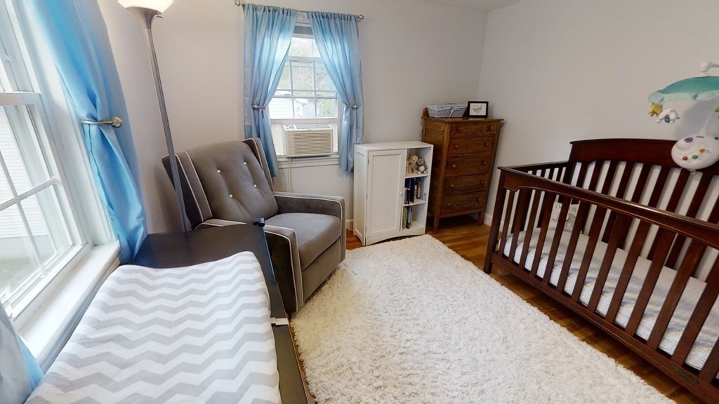 17 Oakcrest Road Needham, MA 02492 - Photo 16 of 31 a bedroom with furniture and a window