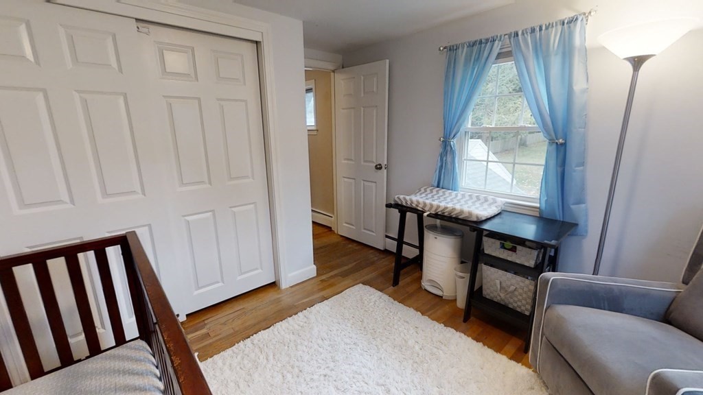 17 Oakcrest Road Needham, MA 02492 - Photo 17 of 31 a living room with furniture and a window