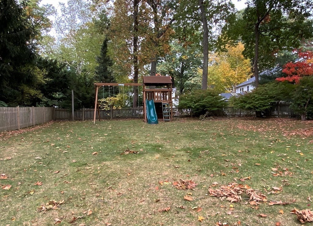 17 Oakcrest Road Needham, MA 02492 - Photo 26 of 31 a view of a yard with plants and a large tree