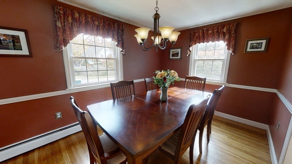 17 Oakcrest Road Needham, MA 02492 - Photo 6 of 31 a view of a dining room with furniture window and wooden floor