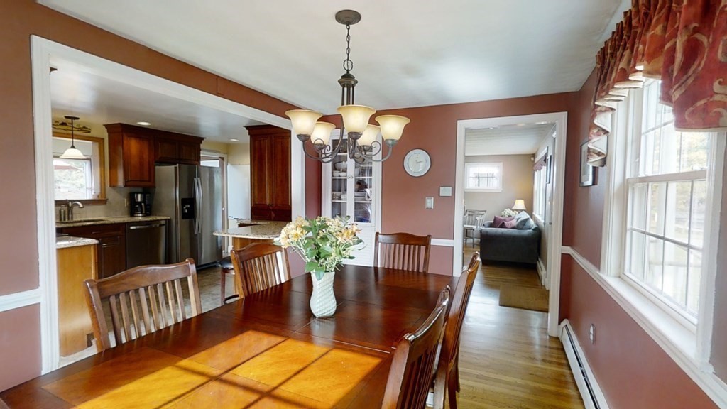 17 Oakcrest Road Needham, MA 02492 - Photo 9 of 31 a dining room with furniture and wooden floor