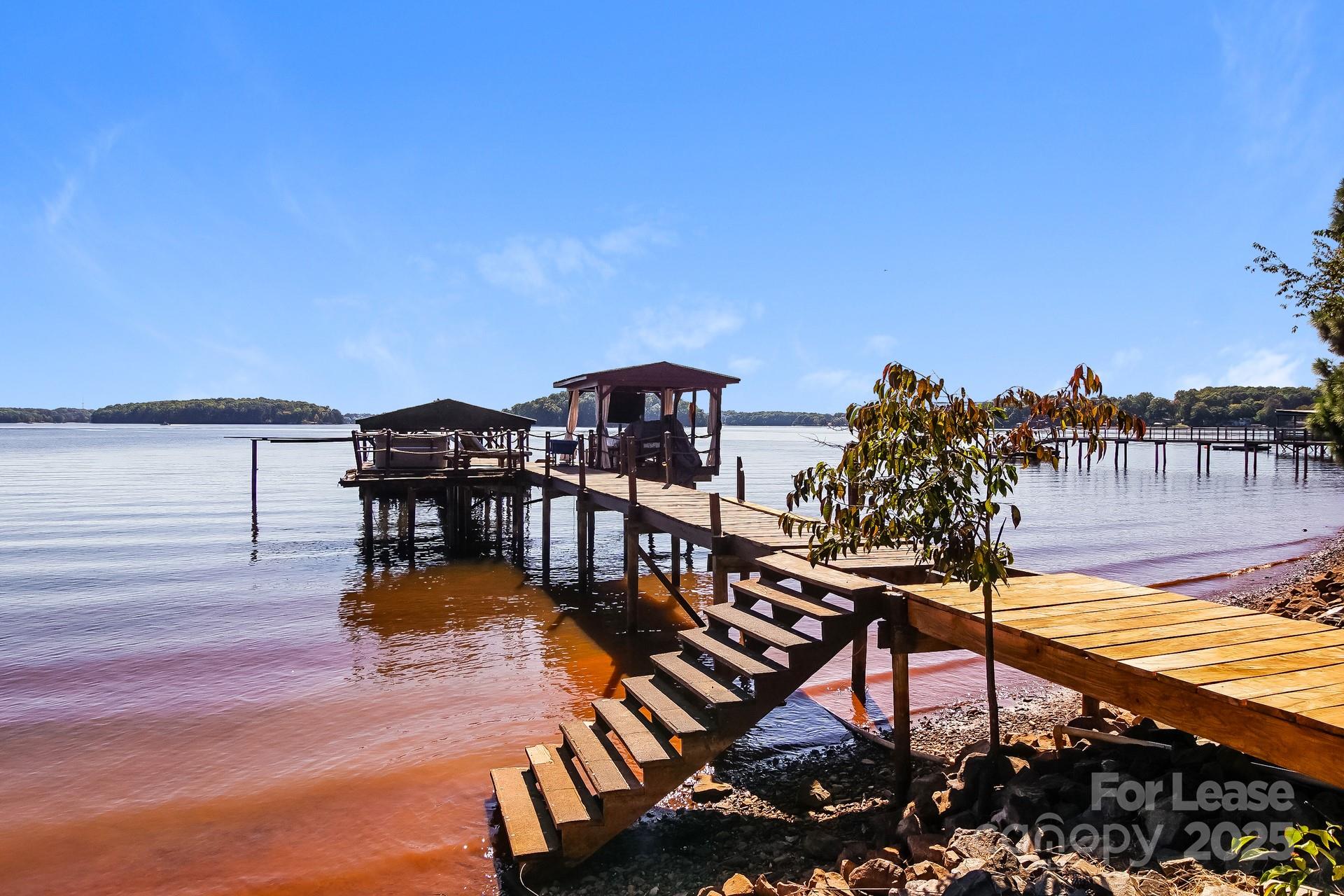 17120 Belle Isle Drive, Unit A Cornelius, NC 28031 - Photo 16 of 16 a view of a swimming pool with an outdoor seating