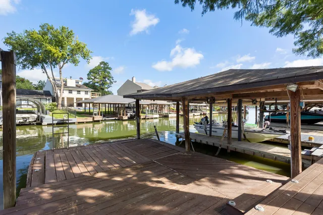 a view of a swimming pool with a patio