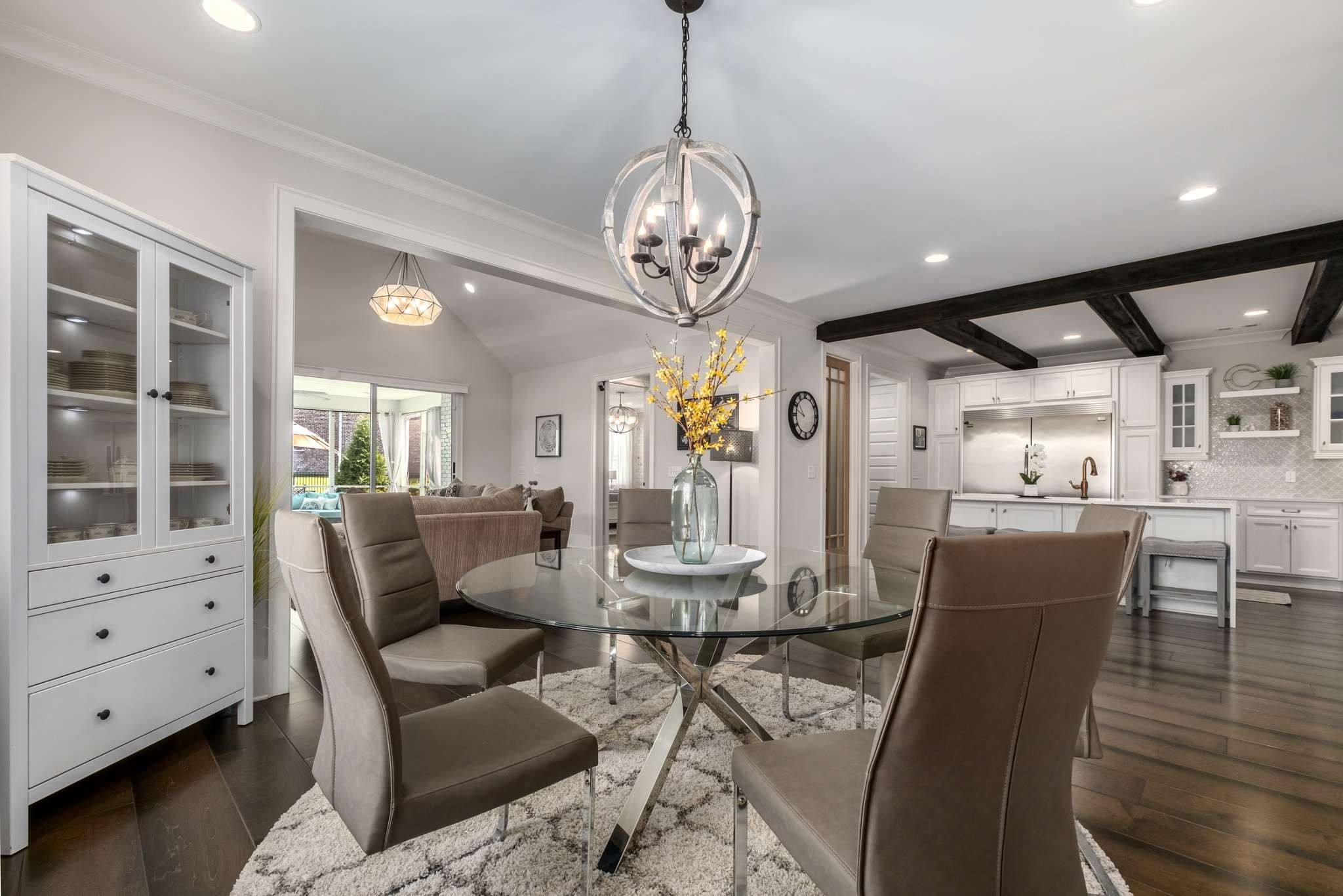 107 Vanner Road Mount Juliet, TN 37122 - Photo 13 of 54 a view of a dining room with furniture window and wooden floor