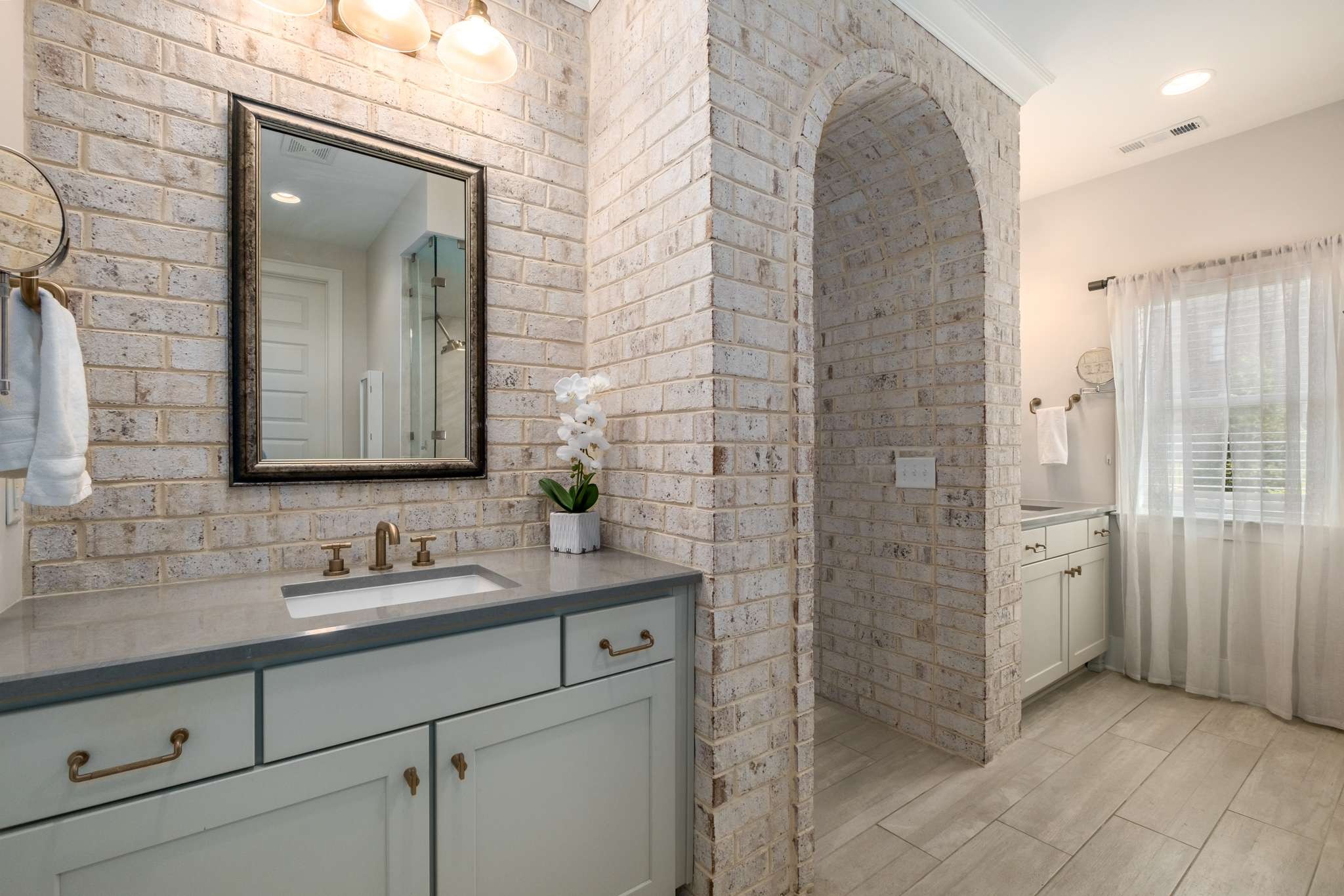 107 Vanner Road Mount Juliet, TN 37122 - Photo 19 of 54 a bathroom with a sink and a mirror