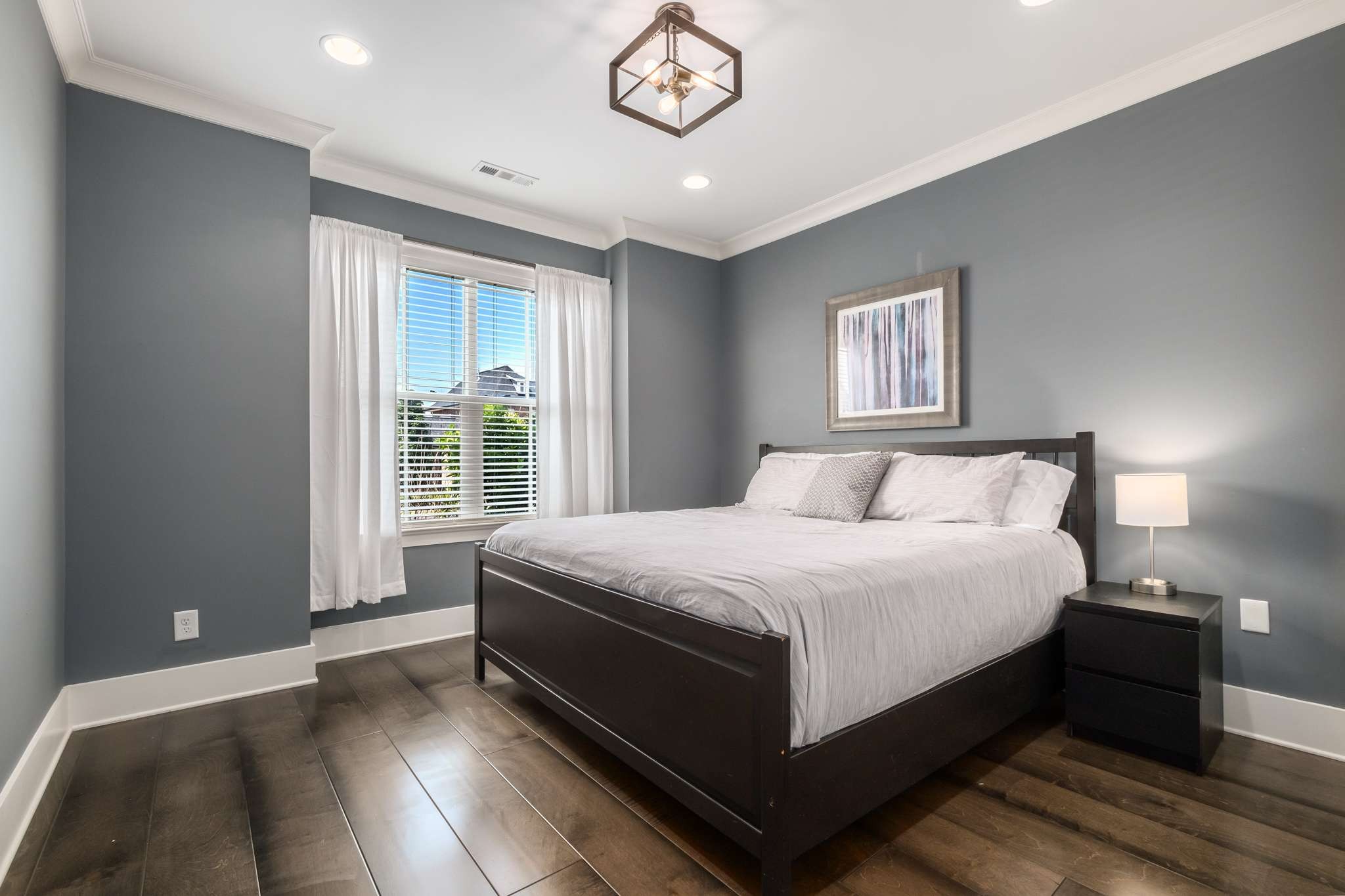 107 Vanner Road Mount Juliet, TN 37122 - Photo 22 of 54 a large bed sitting in a bedroom next to a window