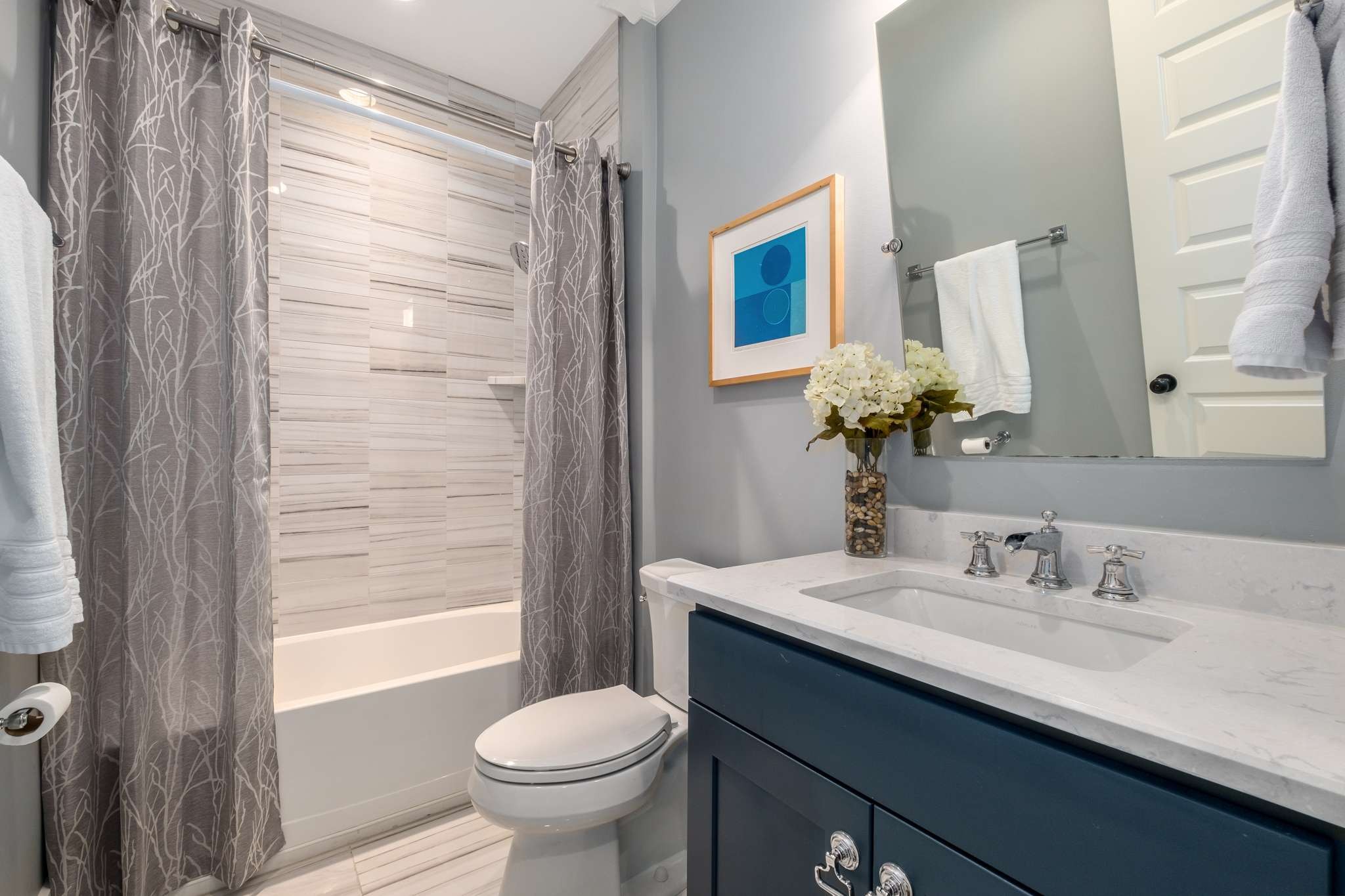 107 Vanner Road Mount Juliet, TN 37122 - Photo 24 of 54 a bathroom with a sink a toilet and shower
