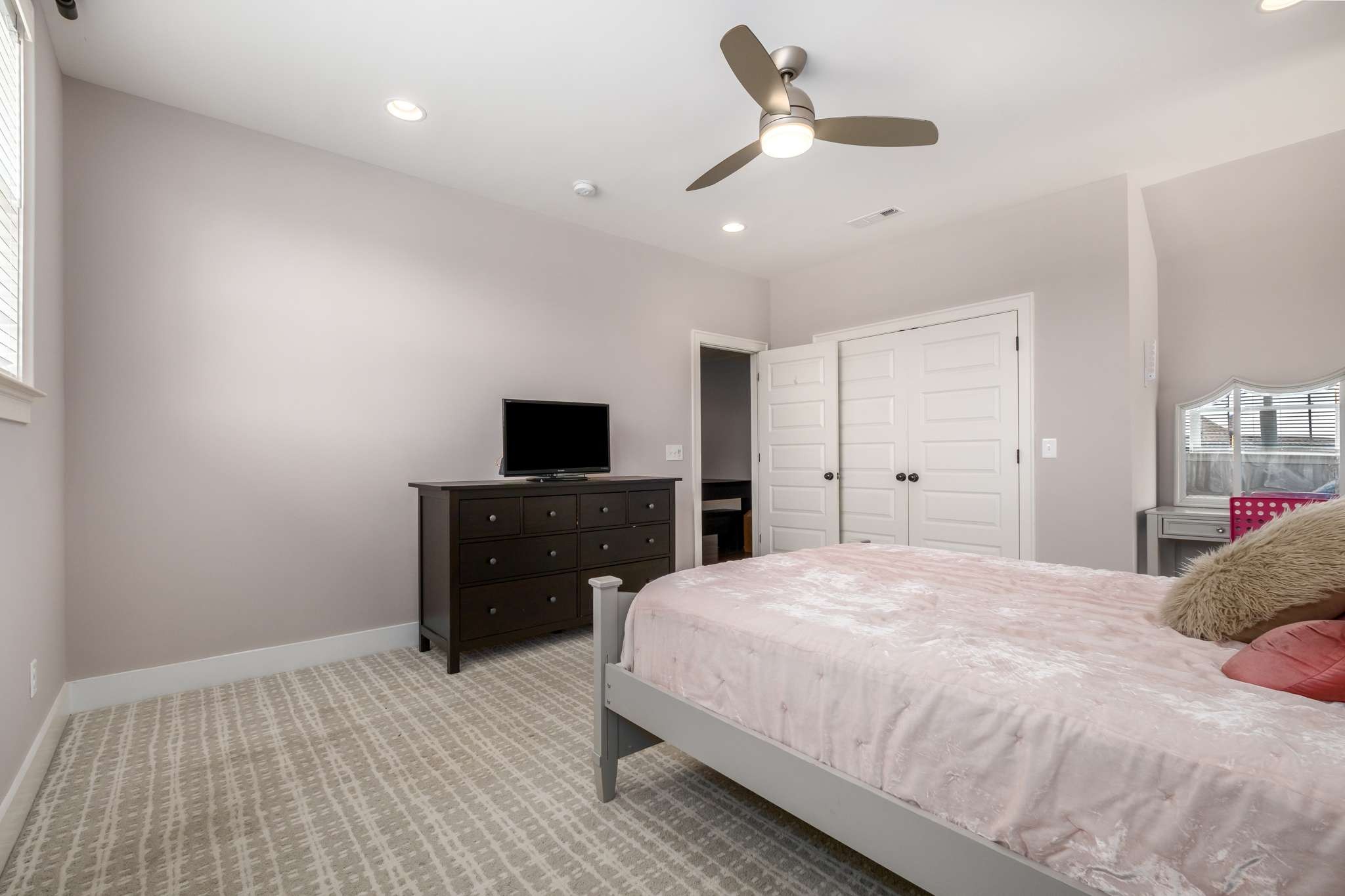 107 Vanner Road Mount Juliet, TN 37122 - Photo 28 of 54 a bedroom with a bed and a flat screen tv