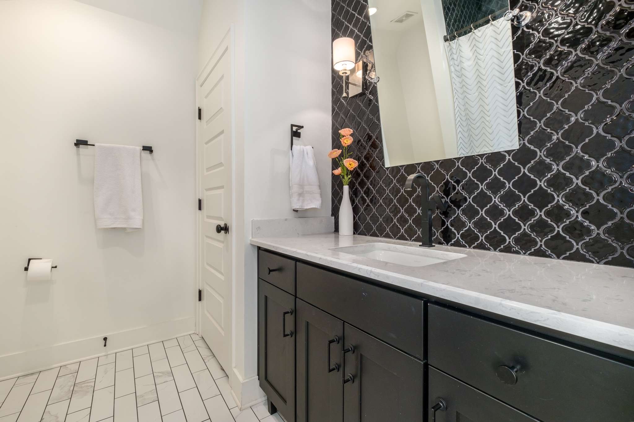 107 Vanner Road Mount Juliet, TN 37122 - Photo 29 of 54 a bathroom with a sink and a mirror