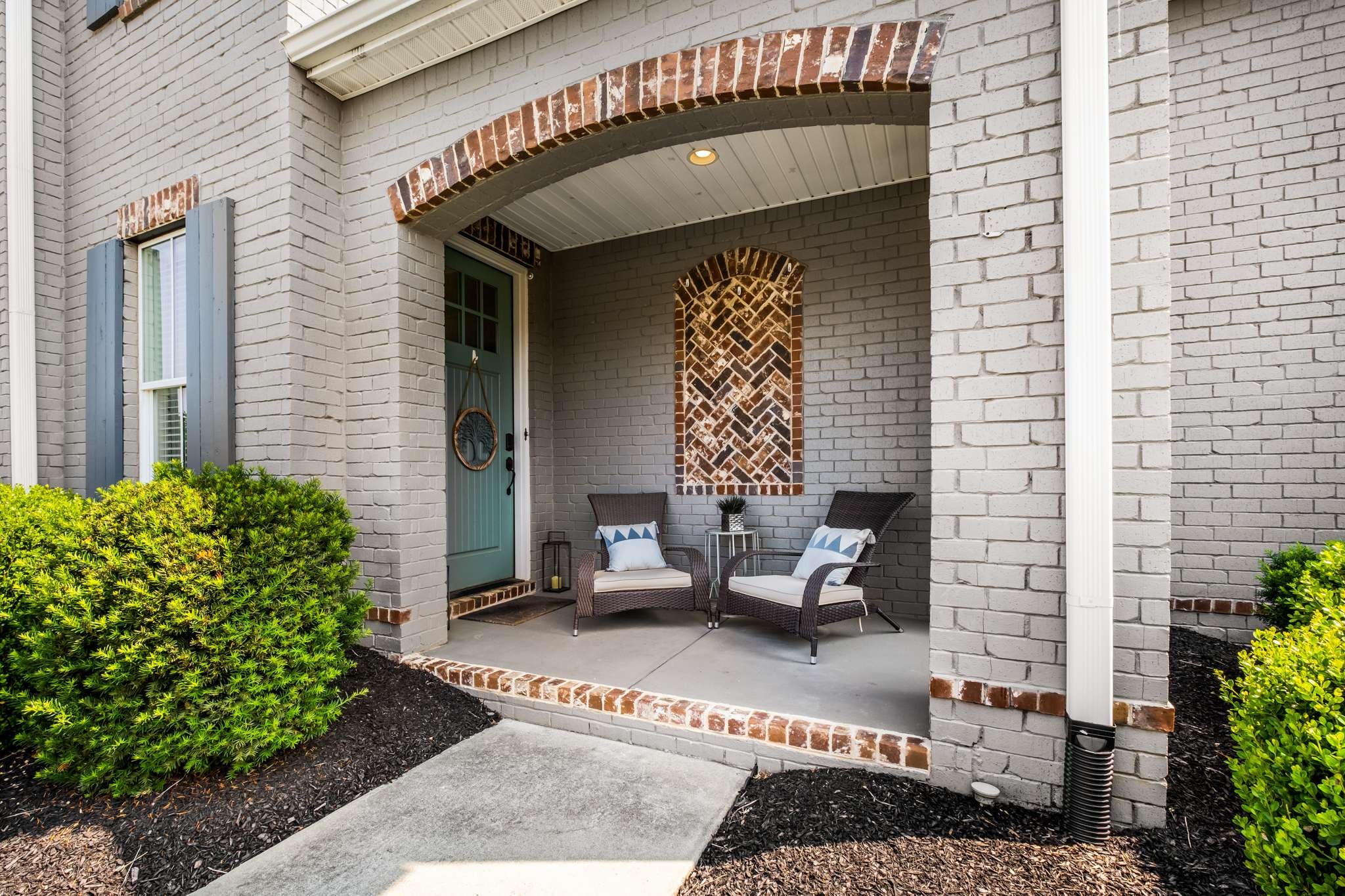 107 Vanner Road Mount Juliet, TN 37122 - Photo 4 of 54 a front view of a house with outdoor seating