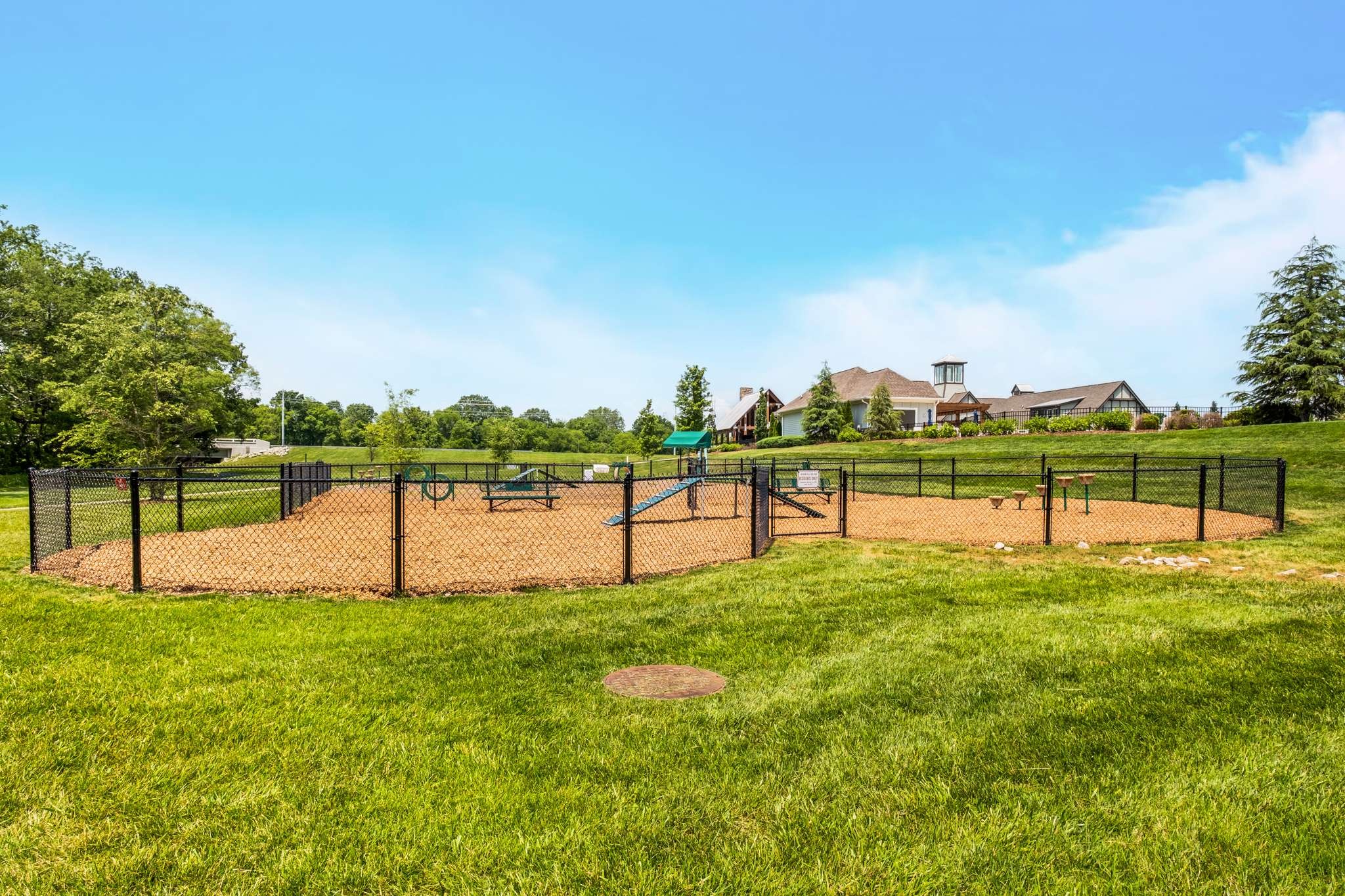 107 Vanner Road Mount Juliet, TN 37122 - Photo 53 of 54 a view of a lake with houses in the background