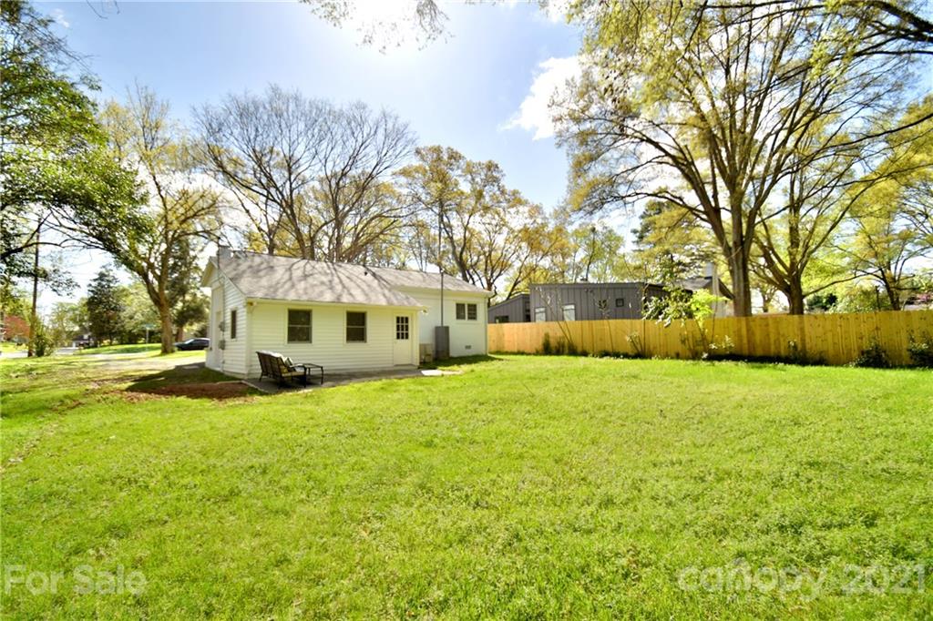 1727 Merry Oaks Road Charlotte, NC 28205 - Photo 20 of 20 a view of a house with a yard