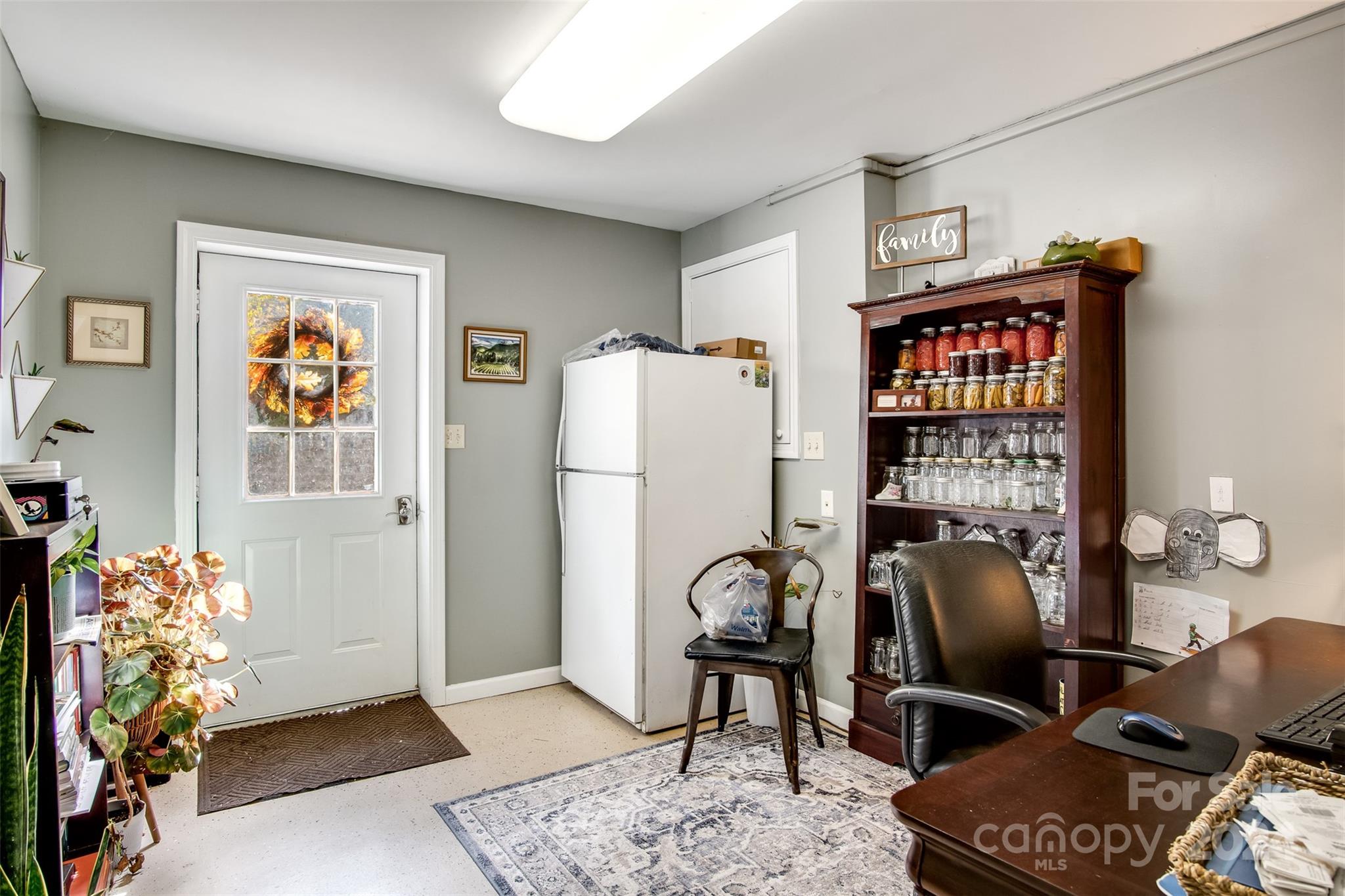 52 Sugar Loaf Road Sylva, NC 28779 - Photo 21 of 45 a workspace with furniture and a couch