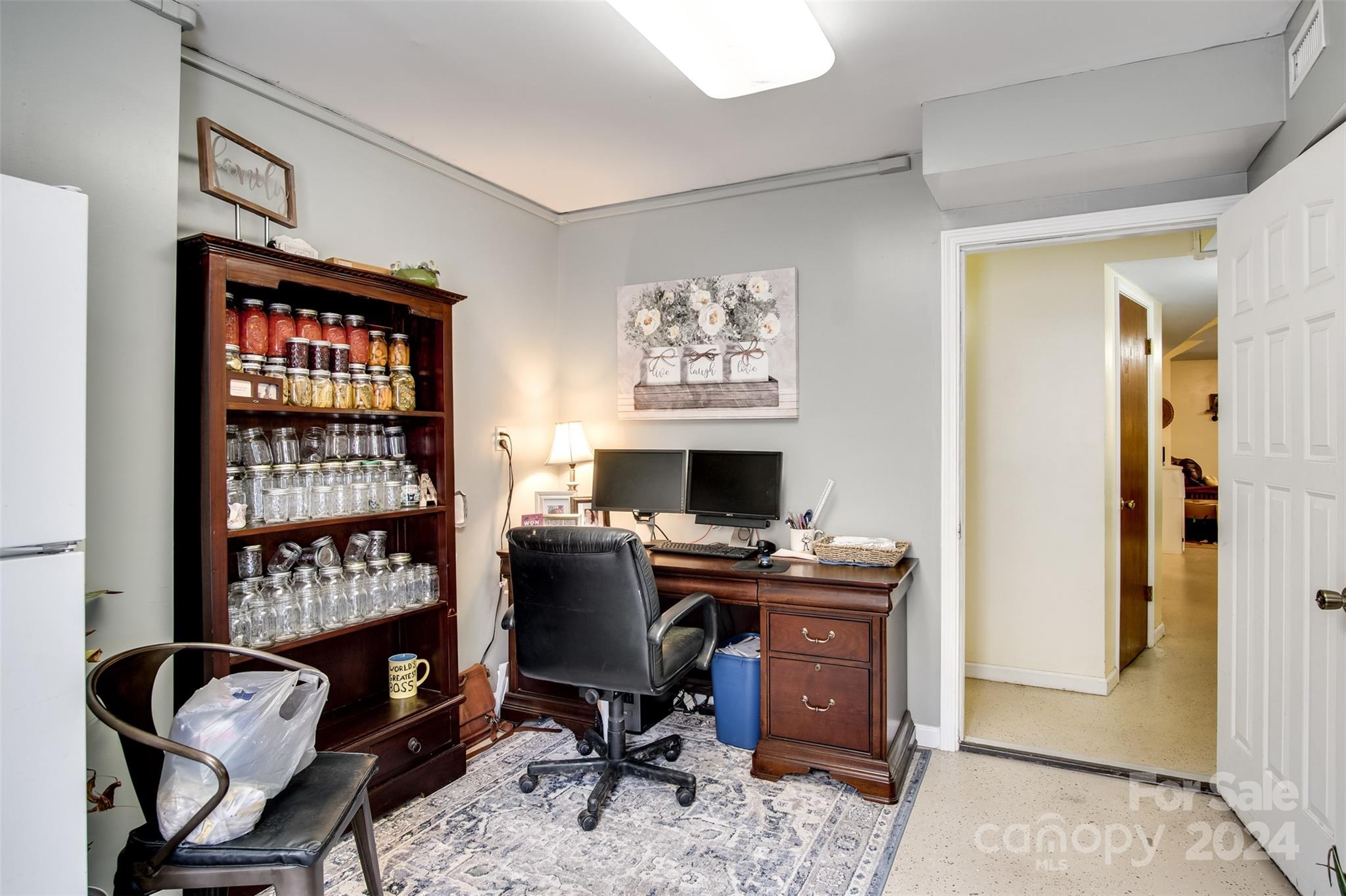 52 Sugar Loaf Road Sylva, NC 28779 - Photo 22 of 45 a view of a workspace with furniture and a window