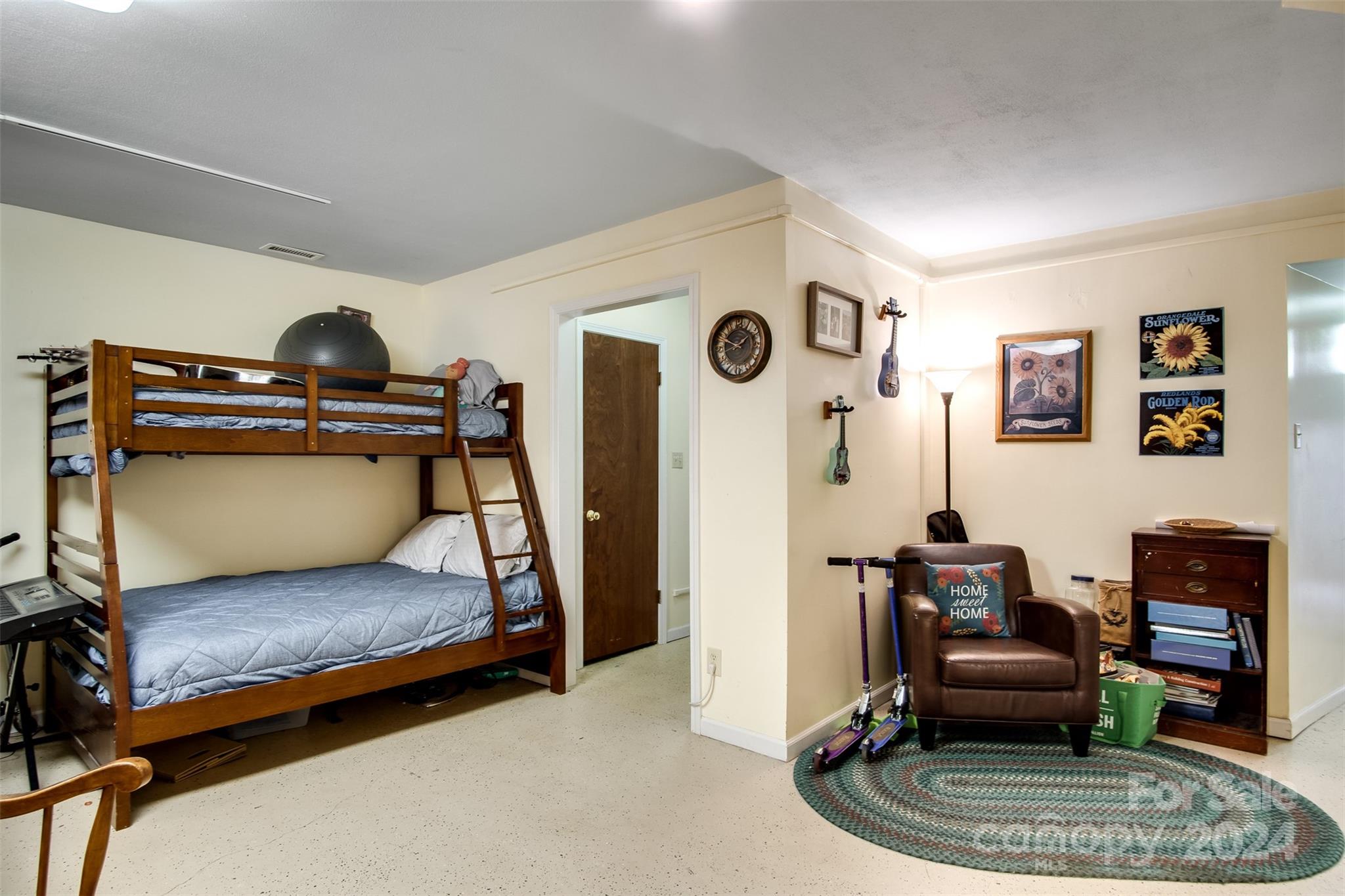 52 Sugar Loaf Road Sylva, NC 28779 - Photo 25 of 45 a room with furniture and a rug
