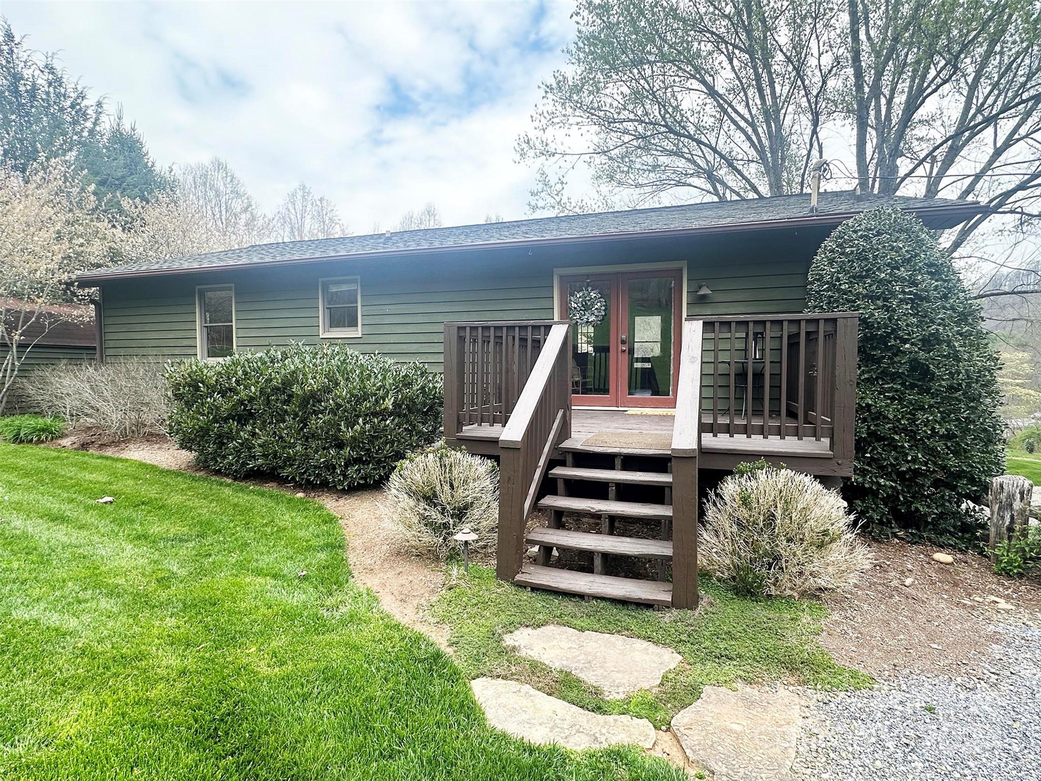 52 Sugar Loaf Road Sylva, NC 28779 - Photo 32 of 45 front view of a house with a yard