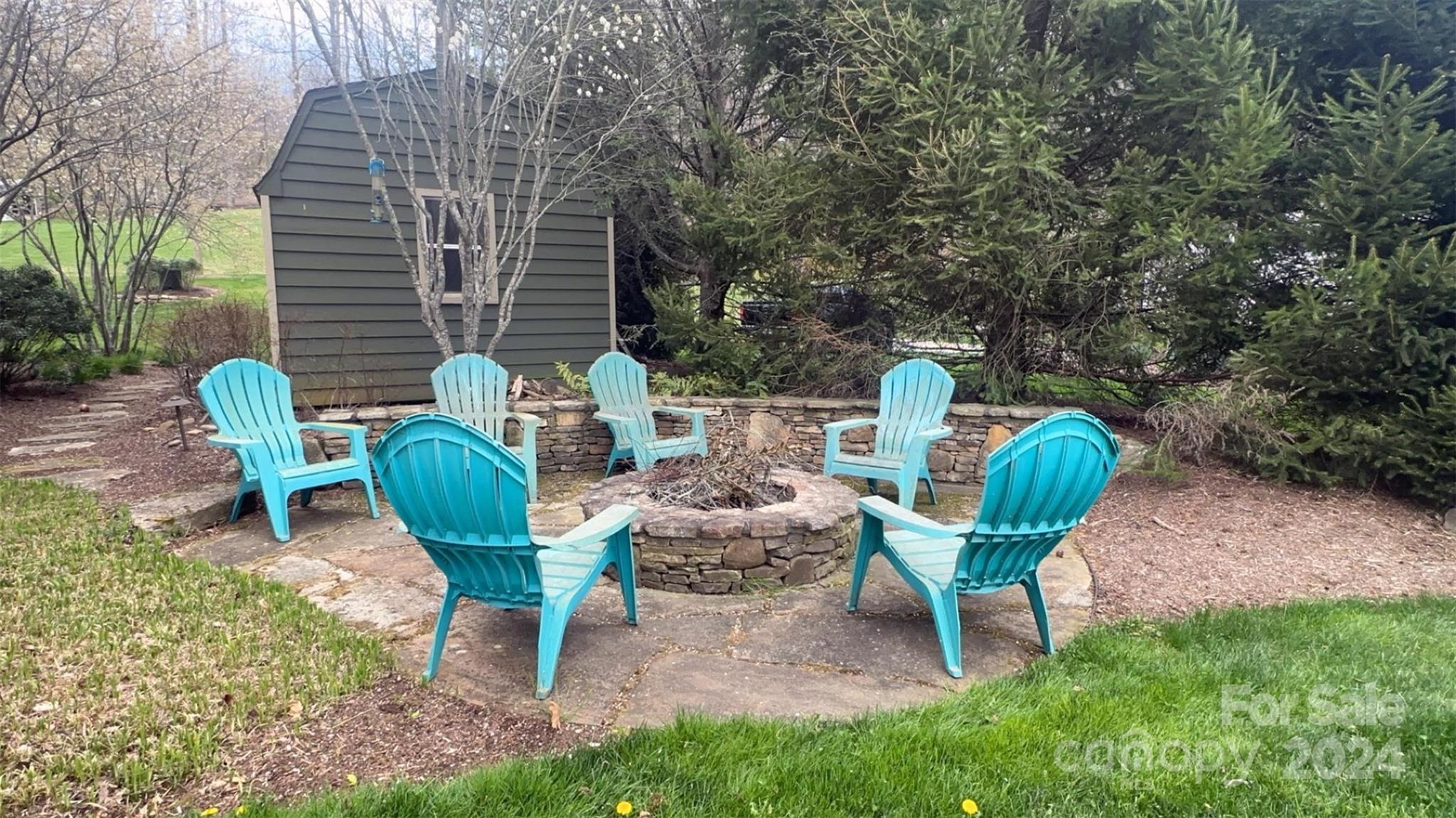 52 Sugar Loaf Road Sylva, NC 28779 - Photo 36 of 45 a view of a chairs in backyard of the house