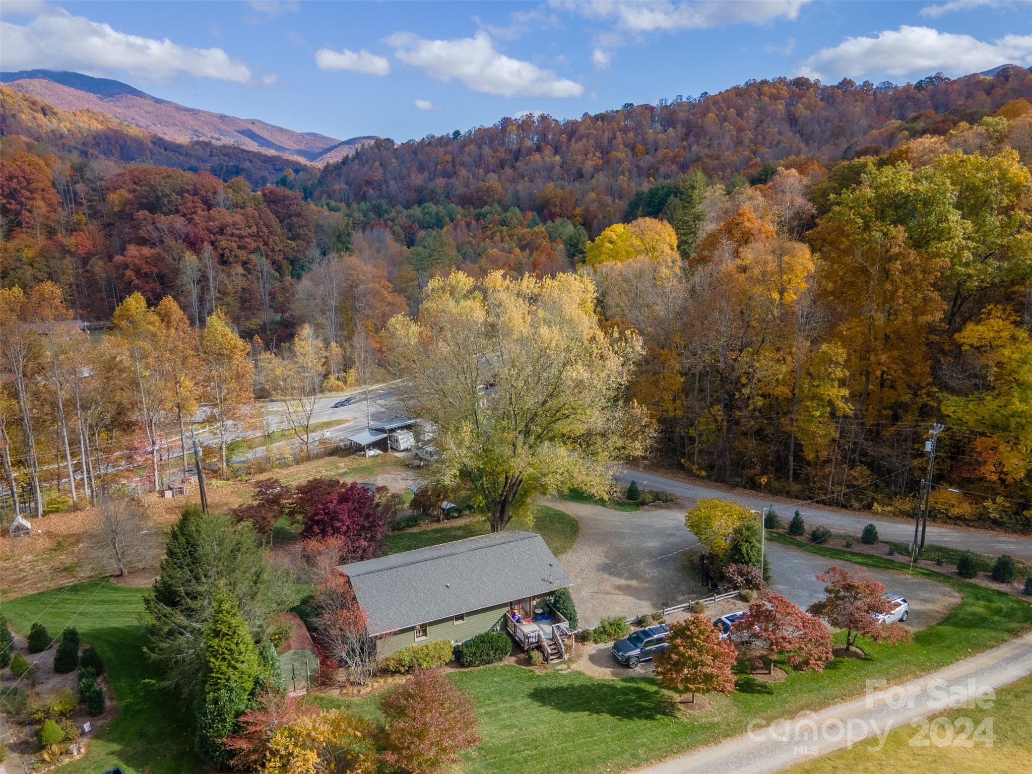 52 Sugar Loaf Road Sylva, NC 28779 - Photo 40 of 45 an aerial view of a house with a garden
