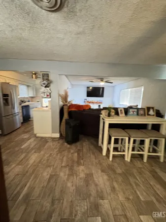 a room with furniture and a flat screen tv