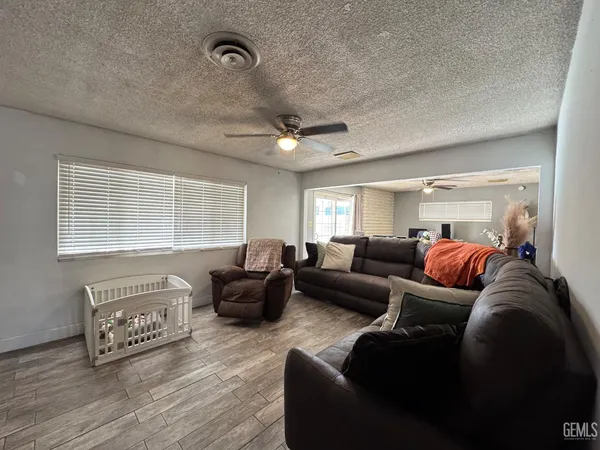 a view of a swimming pool with an outdoor seating