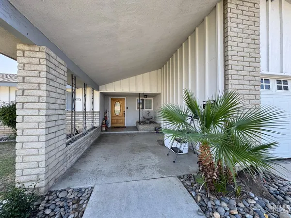 a view of a entryway door front of house