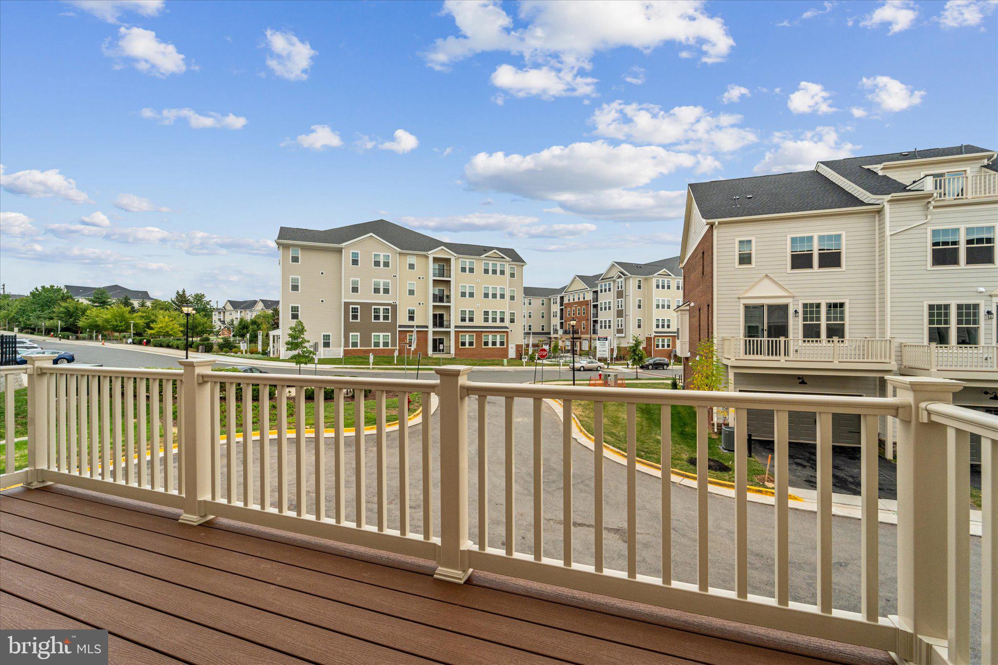 705 Sawback Square Northeast Leesburg, VA 20176 - Photo 14 of 38 a view of a large building from a balcony