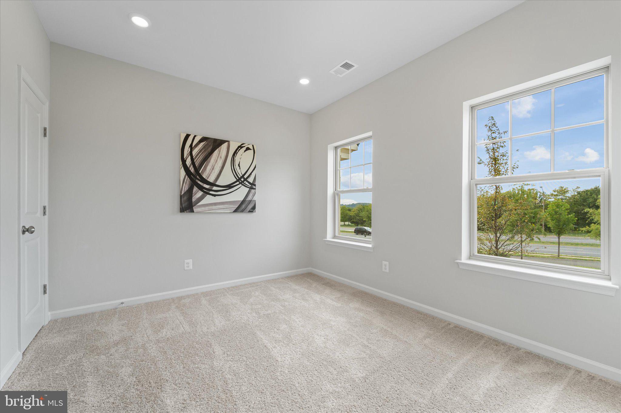 705 Sawback Square Northeast Leesburg, VA 20176 - Photo 3 of 38 a view of room with window
