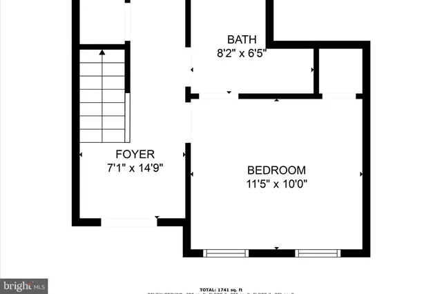 a picture of a bench in front of a wall