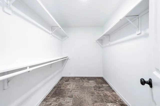 a view of a room with racks on the wall