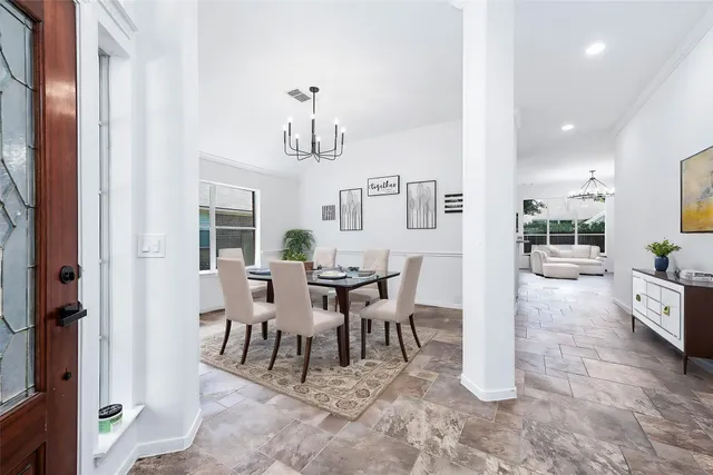 a view of a dining room with furniture