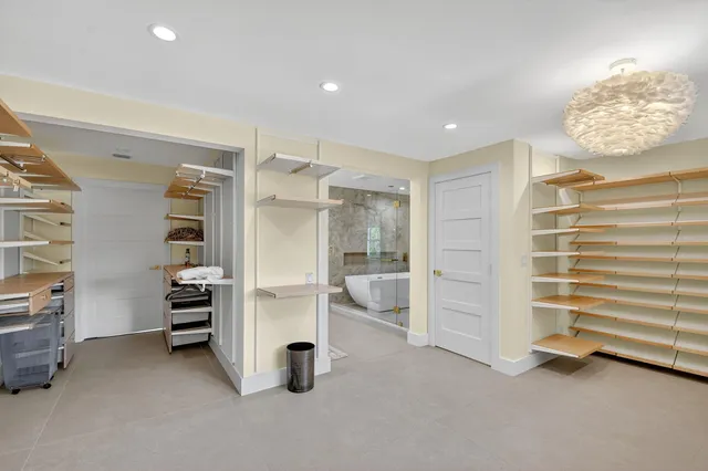 a view of an empty room with a fireplace