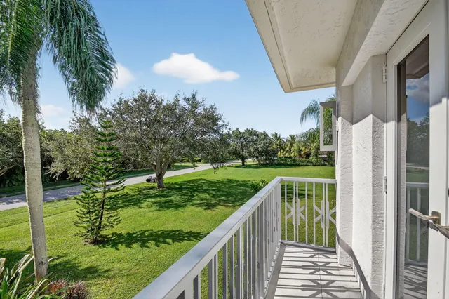 a view of a balcony with an outdoor space